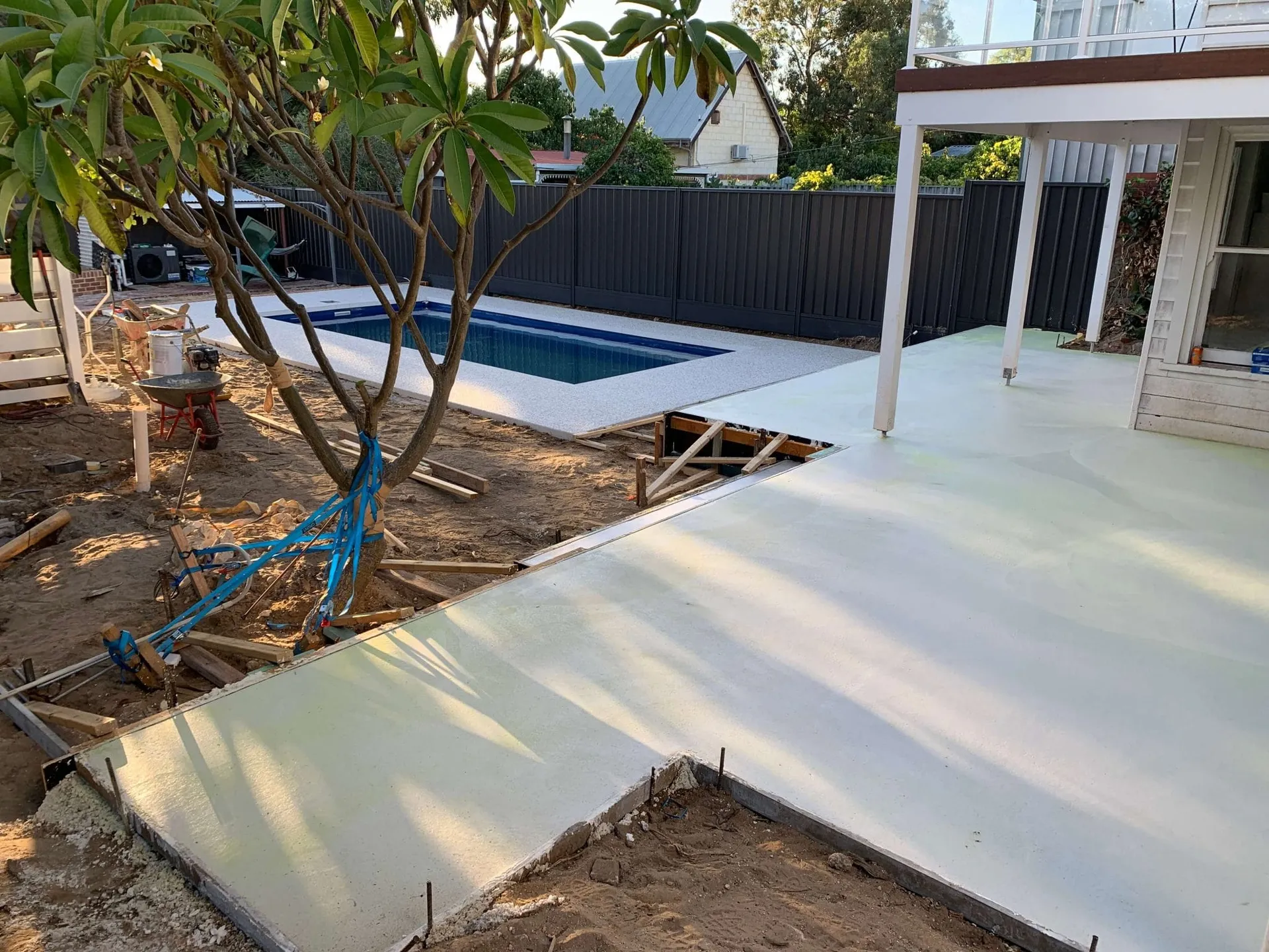 Vertical exposed aggregate retaining wall built as part of the Beaconsfield Perth backyard makeover.