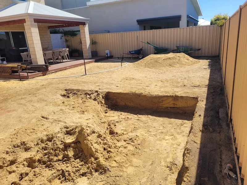 Site prep stage of the Beeliar Perth landscape construction with cleared backyard space.