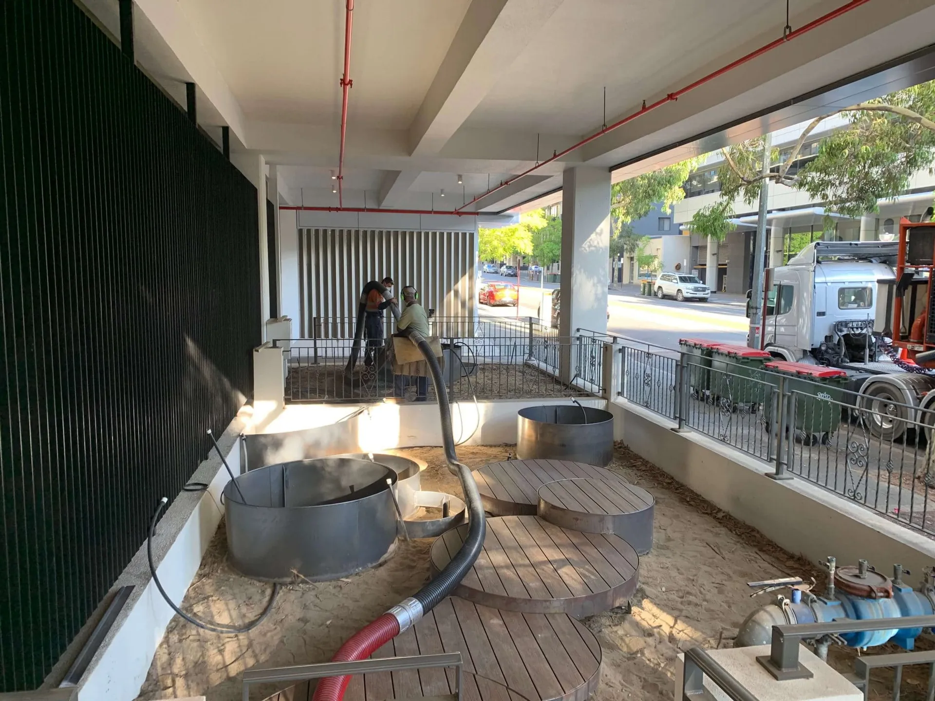 Irrigation system being installed in the Hay Street Perth feature garden beds for the tropical planting.