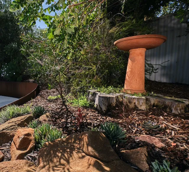Native rockery garden bed built by Perth Landscaping Experts at the Leeming backyard project.