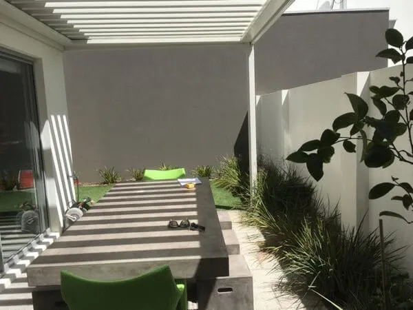 Shaded table area in the South Perth inner-city courtyard before the new garden was installed.