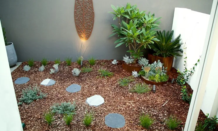 Modern front yard landscaping styling reference used for the South Perth courtyard project.