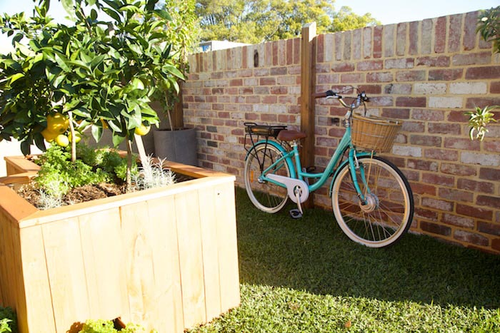 Brick wall with ‘solider’ finish and classic Freo bike